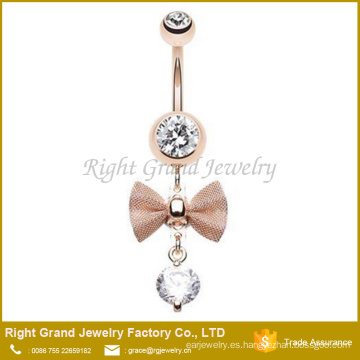 Bow - Tie claro Cubic Zirconia cuelgan oro rosa vientre acero quirúrgico plateado anillo